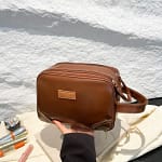 Trousse de toilette femme en cuir